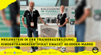 Tim Peter und Carina Schmitt mit einer Urkunde 